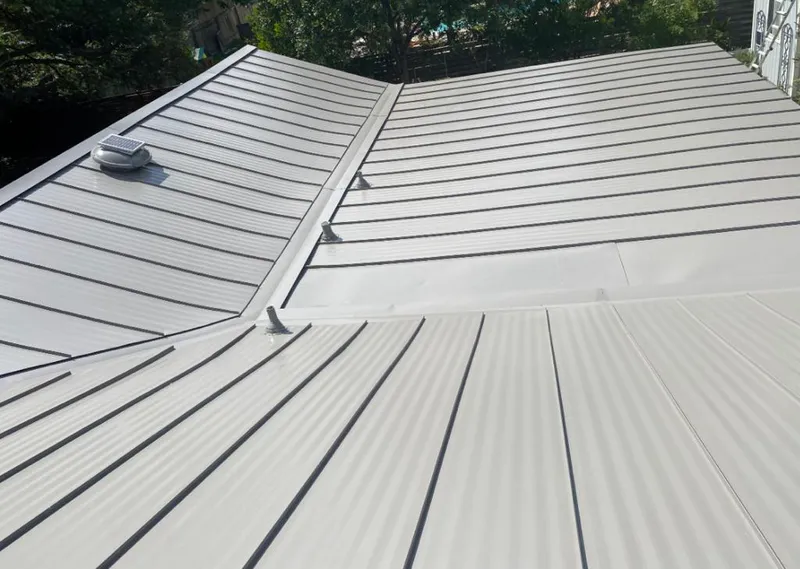 Solar attic fan installed on a metal roof for Roof Ventilation in Lake Stevens